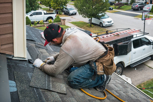 Professional Metal Roofing technician working in Morrisonville, NY